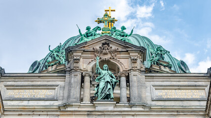 Obraz premium Famous central Unter den Linden street, Berlin Cathedral, Berliner Dome in historical and business downtown of Berlin, Germany, at summer sunny day and blue sky.