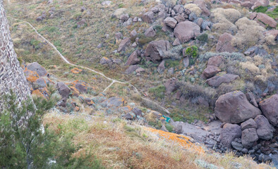 Aerial view of stone path in the mountains, rocky area in Sardinia 