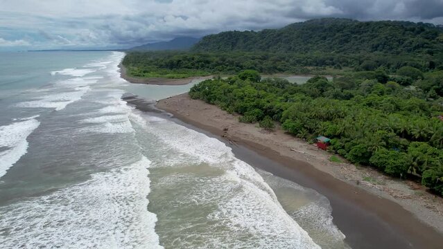 Beautiful aerial view of Dominical Beach and The Baru River in Costa Rica