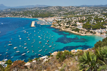 Moraira view from cap d'or with many boats