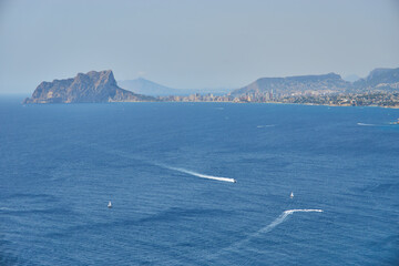 Moraira view from cap d'or with many boats