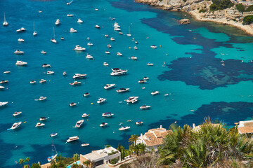 Moraira view from cap d'or with many boats