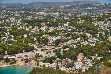 Moraira view from cap d'or with many boats