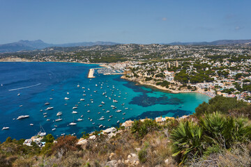 Moraira view from cap d'or with many boats