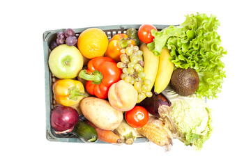 Fresh ripe vegetables and fruits in crate isolated on white background,top view