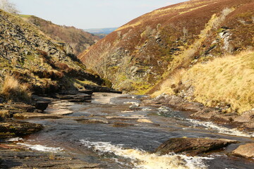 river in the mountains in autumn
