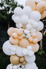 Part, element of an arch from balloons close-up in the park outdoors. Photography, children's birthday, design.