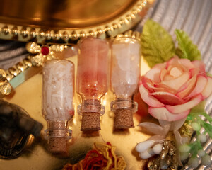 Small bottles of crystals on a table