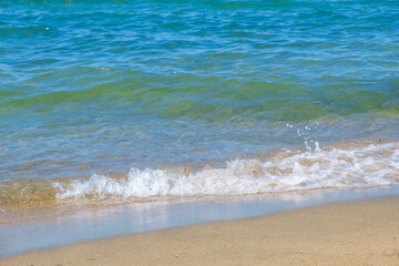 waves on the white beach