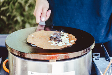 breton galette. buckwheat crepe. making buckwheat pancakes.