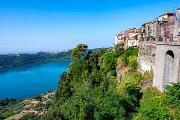 Naklejka premium Small historical town Nemi, view on green Alban hills overlooking volcanic crater lake Nemi, Castelli Romani, Italy in summer