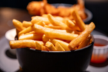 Dutch snacks for beer or wine, french fried potato chips and deep fried tempura shrimps and hot dip...