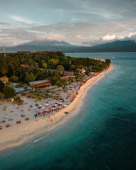 Aerial Bliss: Gili Air, Bali's Exotic Island Paradise with Idyllic Beach Life, Blue Waters, and Romantic Sunsets. Your Tropical Honeymoon Retreat in Asia's Indonesia © Mike Khokhlov