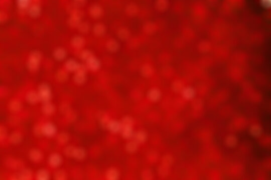 photo unfocused red glitter background 