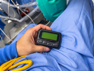 medical communication: A hospital pager signifies instant connection, urgency, and teamwork in healthcare