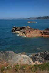 Monolithic blocks of pink granite in the Cotes d'Armor in Brittany, France. Pink granite coast