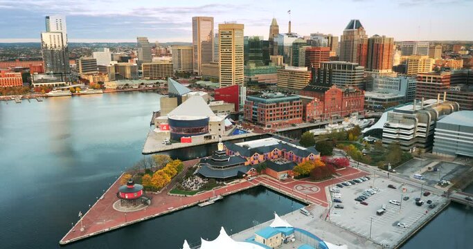 Downtown cityscape and marina on the Inner Harbor of Baltimore Maryland flowing out to the Patapsco River and Chesapeake Bay
