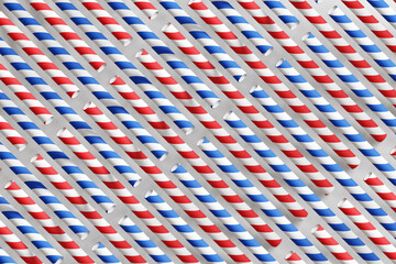 Fototapeta premium Red and blue striped paper straws placed alternatively. Illustration of the problem with paper straws and as design element for website template background and slide show presentation wallpaper