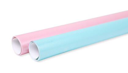 Rolls of colorful wrapping papers on white background