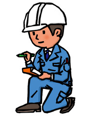 調査し記録している作業服の男性