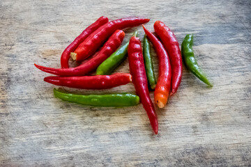 red hot chili peppers on wooden background