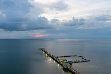 Aerial view of the Fairhope Pier at sunset