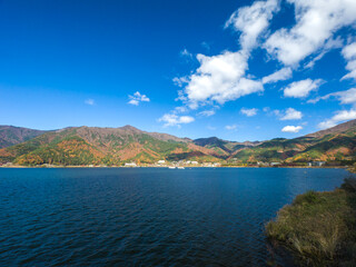 Huge lake and autumn coloured mountains (Lake Kawaguchi, Yamanashi, Japan)