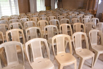 arrangement of chairs in wedding hall