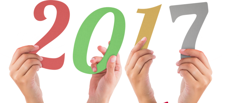 Digital png illustration of hands holding 2017 number on transparent background