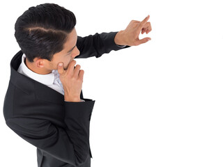 Digital png photo of biracial businessman pointing with finger on transparent background