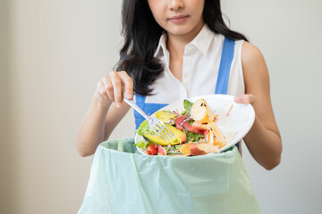 Food waste environment concept, people throwing food garbage into bin prepare to decompose.