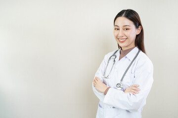 portrait female modern doctor standing crossed arm isolated on background
