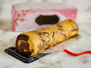 marble  brownies roll cake on the table