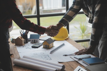 Engineer Teamwork Meeting, Drawing working on blueprint meeting for project working with partner on model building and engineering tools in working site, Construction and structure concept.