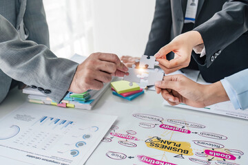 Fototapeta premium Business handshake for teamwork of business merger and acquisition,successful negotiate,hand shake,two businessman shake hand with partner to celebration partnership and business deal concept.