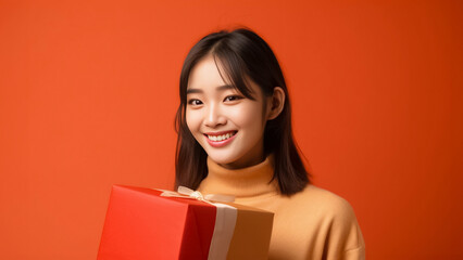 Naklejka premium Asian woman prepares a package for online shopping delivery, while a cheerful delivery woman in an orange uniform stands with a parcel post box. Generative AI.
