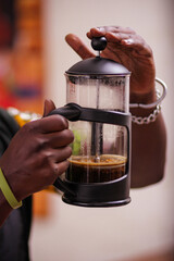 Fototapeta na wymiar pouring coffee into a glass