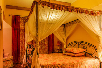 bedroom with bed and curtains