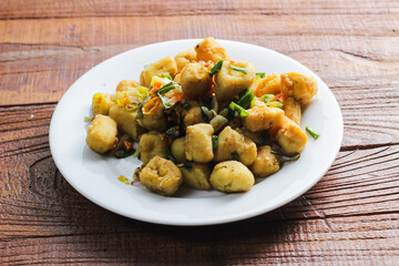 Salt Chilli Tofu with Scallions. Healthy snack for vegans.