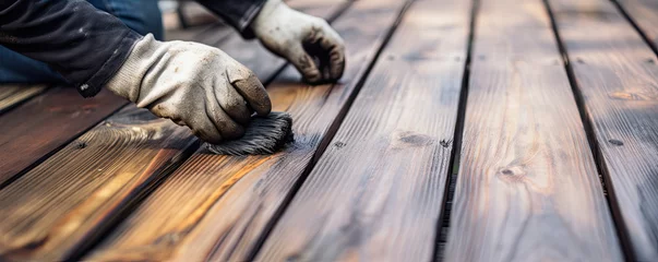 Deurstickers Hands detail of restore wooden terrace. wide banner © Michal