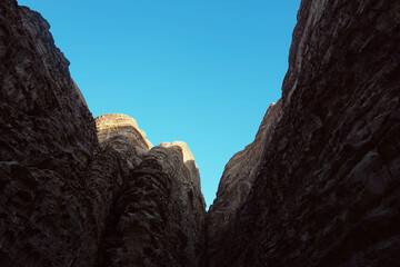 Red rock canyon with clearly blue sky in the background - abstract minimalistic photography (Wadi...