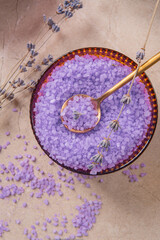 Lavender cooking salt in glass decorative plate with gold teaspoon