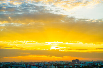 Sunrise with cloud and building in the city