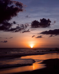 Setting sun sinking into the Caribbean Sea.