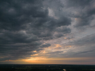 cloudscape sky in sunset from aerial view. storm clouds over