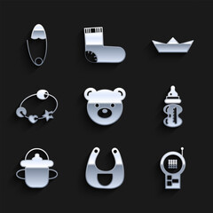 Set Teddy bear plush toy, Baby bib, Monitor Walkie Talkie, bottle, Rattle baby, Folded paper boat and Classic steel safety pin icon. Vector
