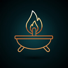 Gold line Aroma candle icon isolated on dark blue background. Vector