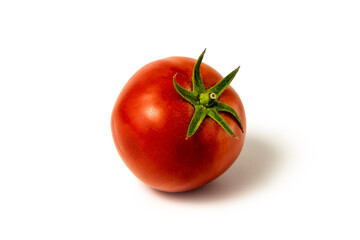 Tomato isolated on white background. Fresh ripe red tomato. With clipping path. Full depth of field.