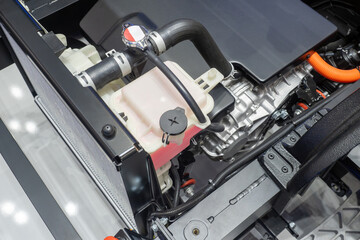 Car cooling radiator. Disassembled vehicle. Radiator near internal combustion engine. Vehicle...