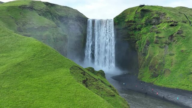 Beautiful Icelandic waterfall Skogafoss. Skogafoss is one of the biggest waterfall in Iceland. Slow motion.